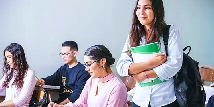 College students in class. Photo by Javier Trueba.