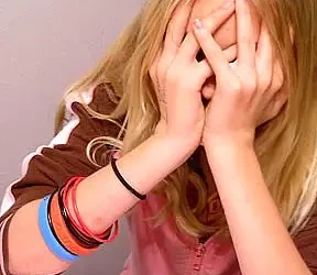 Young girl showing the mental stuggles that come with dyslexia. Photo by Kristine Lewis. Flickr.