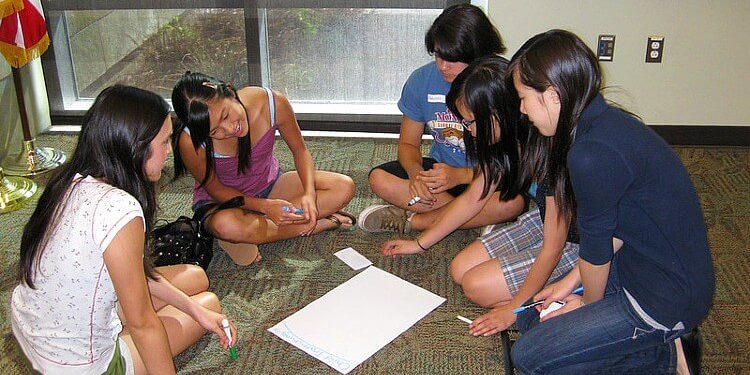 Group Discussing What They Learned About Child Trafficking. Photo by San José Public Library. Flickr.