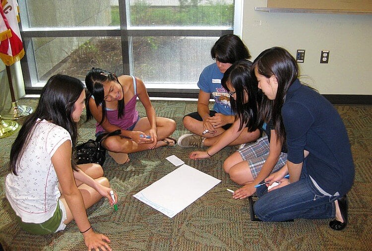 Group Discussing What They Learned About Child Trafficking. Photo by San José Public Library. Flickr.
