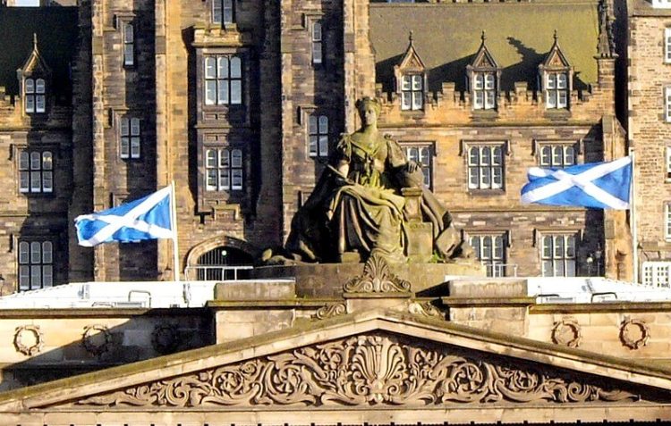 Scottish flags on a windy day in Edinburgh. Photo by Rev Stan. Flickr.