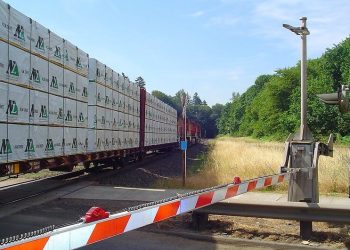 Canada softwood lumber dispute settled. Canadian Lumber Headed South through Portland, Oregon. Photo by born1945. Flickr.