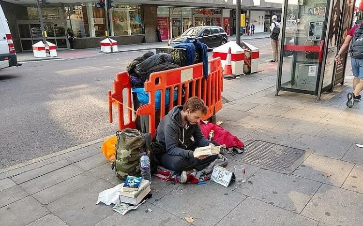 Homeless in London, Tottenham Court Road. Photo by Philafrenzy. Wikimedia.