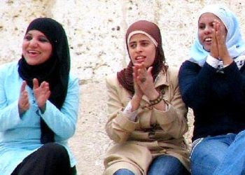 Women from Jordan in a happy mood. Photo by Melenama. Flickr.