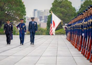 Chairman of the Joint Chiefs of Staff Air Force Gen. CQ Brown, Jr., participates in an honor guard ceremony at the Japan Ministry of Defense in Tokyo. Photo by CPO Mullen. DOD.