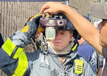 Firefighter familiarizes himself with the heads-up display of the C-THRU Navigator during an operational field assessment. Photo by S&T. DHS.