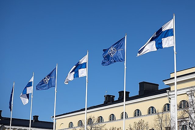 Flags of Finland and NATO. Photo by Finnish Government. Wikimedia.