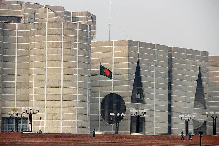 Bangladesh Flag & Parliament Building. Photo by Gary Lee Todd, Ph.D. Flickr.