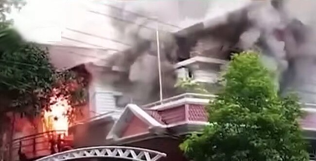 Bangladeshi Government official home set on fire. Image by Indian Times. YouTube.