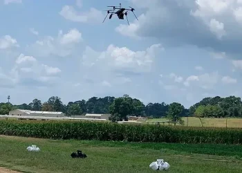 The Bellbird Aerial Communications Platform hovers over a series of bucket targets during a July 2024 operational field assessment in Mississippi. Photo by S&T. Department of Homeland Security.