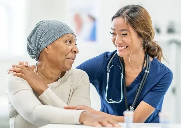 Caring for a cancer patient. Photo by Medicines and Healthcare products Regulatory Agency.