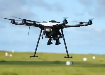 A drone hunter with the capability to capture opposing drones with nets prepares to move across the marked test field after its target. Photo by UND and NPUASTS.