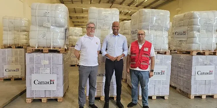 Canadian Minister of Development and Hosam Faysal in Dubai relief hub. Photo by Hosam Faysal.