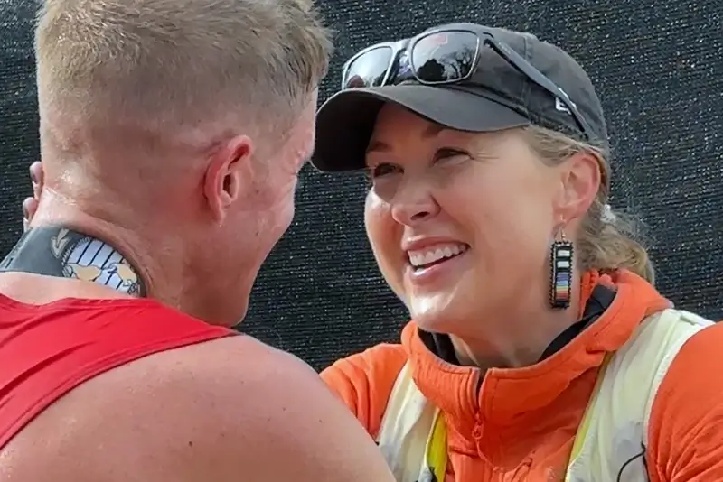 Hope Sweetnam congratulates her boyfriend, Marine Maj. Kyle King, assigned to Marine Corps Air Ground Combat Center in Twentynine Palms, California. Photo by Shannon Collins. DOD.