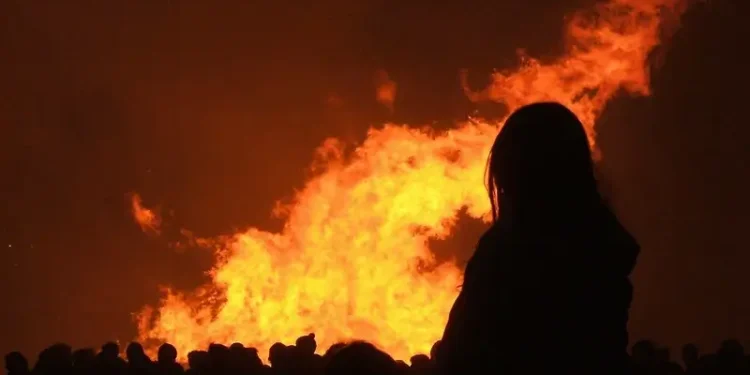 Lewes Bonfire Night - Bonfire Onlooker. Photo by Dominic Alves.