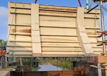 The first of three new gates being installed at the Leigh flood storage area, which will soon hold 25 per cent more water back from communities. Photo by the Environment Agency.