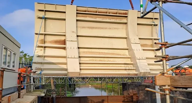 The first of three new gates being installed at the Leigh flood storage area, which will soon hold 25 per cent more water back from communities. Photo by the Environment Agency.