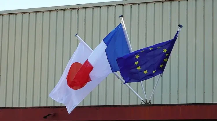 Japan and EU flags. Photo by Guilhem Vellut.