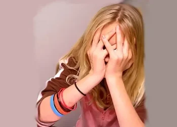 Young girl showing the mental struggles. Photo by Kristine Lewis.