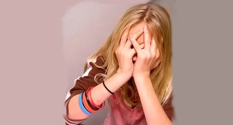 Young girl showing the mental struggles. Photo by Kristine Lewis.