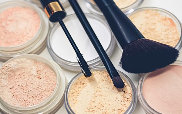 Cosmetics and makeup brushes. Photo by the UK Government.
