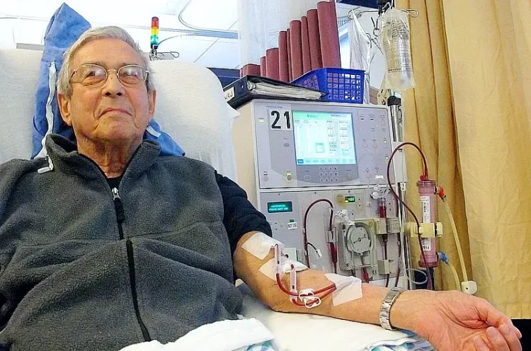 Older patient receiving dialysis. Photo by Anna Frodesiak.