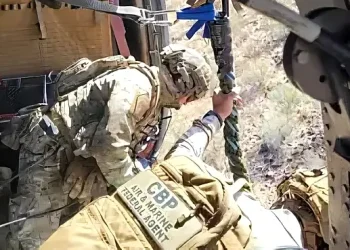 AMO and BORSTAR working together in an AMO UH-60 Black Hawk. Photo by the CBP.