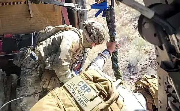 AMO and BORSTAR working together in an AMO UH-60 Black Hawk. Photo by the CBP.