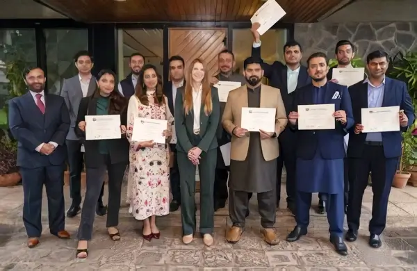 Reception with scholars and their certificates. Photo by British High Commission Islamabad.