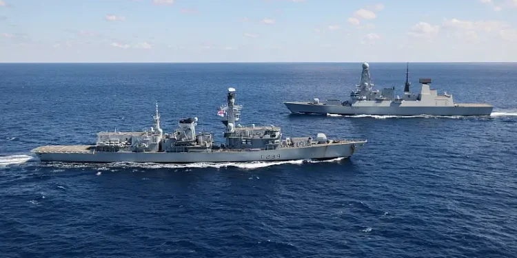 Royal Navy ships at sea - HMS Richmond and HMS Diamond. Naval communications upgrade. Photo by the MOD.