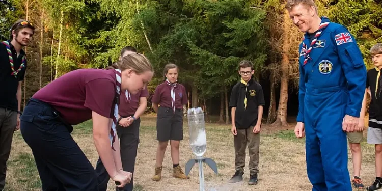 Astronaut Tim Peake launching bottle rockets at a Scouts event. Photo by the Scouts.