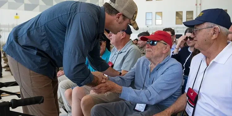 Defense Secretary Pete Hegseth shakes hands with a World War II veteran attending a ceremony at Andersen Air Force Base, Guam, March 27, 2025. Photo by Air Force M Keech.