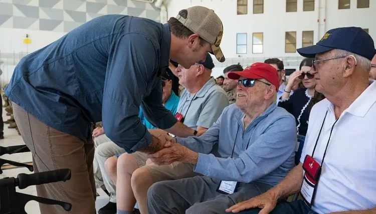 Defense Secretary Pete Hegseth shakes hands with a World War II veteran attending a ceremony at Andersen Air Force Base, Guam, March 27, 2025. Photo by Air Force M Keech.