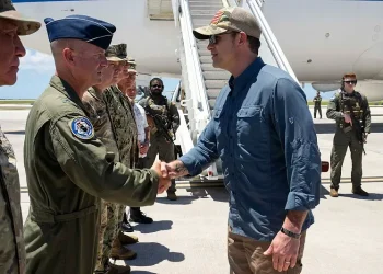 Defense Secretary Pete Hegseth shakes hands with senior leaders at Andersen Air Force Base, Guam, March 27, 2025. Photo by M Keech.