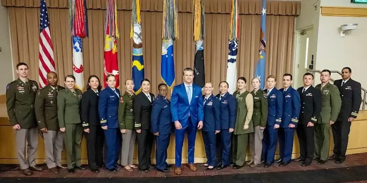 Defense Secretary Pete Hegseth stands with military mentors participating in the United States Senate Youth Program at the Pentagon, March 7, 2025. Photo by Senior airman M. Keech.