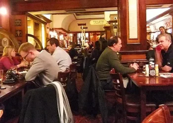 People in a London pub. Photo by Oatsy40.