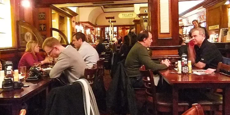People in a London pub. Photo by Oatsy40.