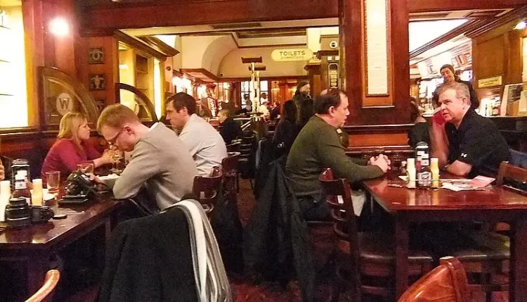 People in a London pub. Photo by Oatsy40.