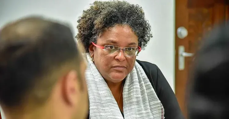 Prime Minister Mottley in conversation. Photo by PMO Barbados.