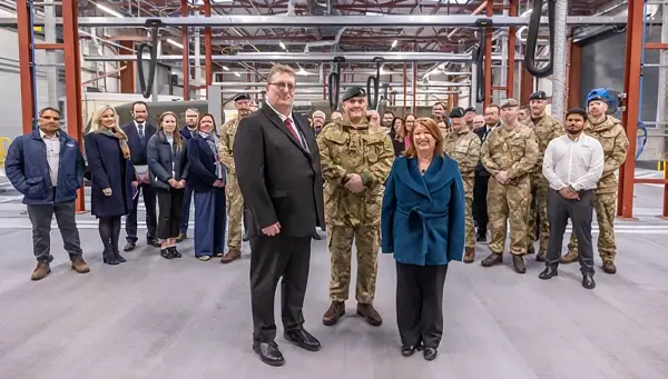 Representatives of the ABP Leuchars Project delivery team with REME personnel inside the new Central Servicing and Inspection Facility. Photo by McLaughlin and Harvey.
