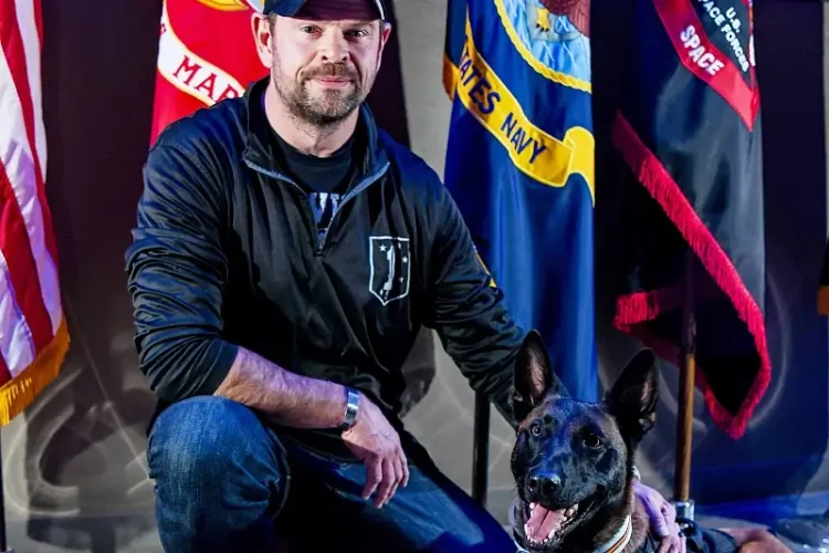 Retired Marine Corps Chief Warrant Officer 3 Thomas J. Heaton with his service dog, Colt, at Schriever Space Force Base, Colo., Jan. 17, 2025. Photo by T Williams.