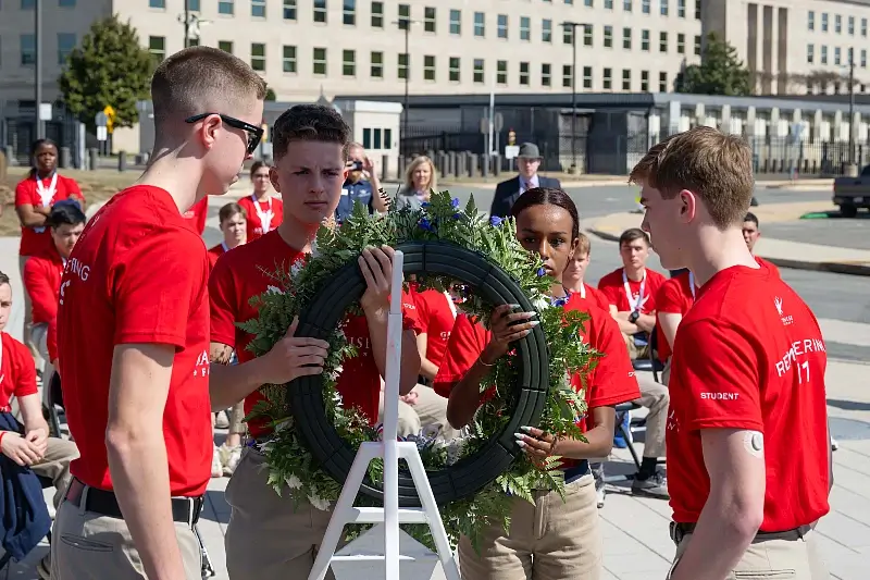 Student cadets from Randolph-Macon Academy lay a wreath during a ceremony for the Gary Sinise Foundation’s 9-11 educational program at the Pentagon Memorial, Washington. Photo by S. Perkins.