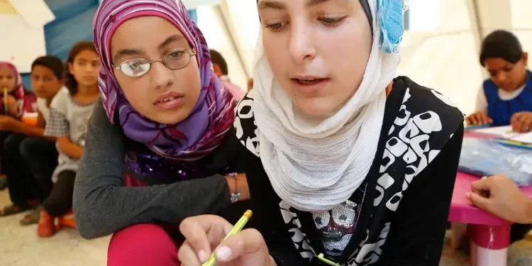 Working together to help Syrian refugee children in Lebanon. Photo by DFID.