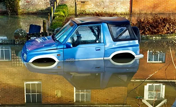 Car part submerged in a flood. Photo by the Environment Agency.