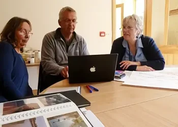 Reviewing flood memory documents. Photo by Sustainable Flood Memory project.