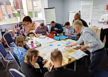 Workshop participants discussing engagement challenges. Photo by Icarus.