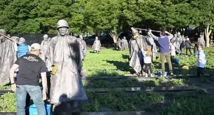 Defense Secretary Pete Hegseth cleans the Korean War Memorial in Washington, May 24, 2025. Photo by the DOD.