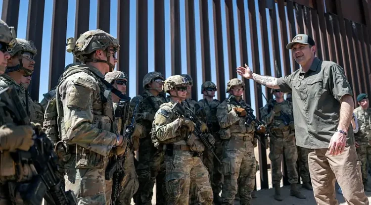 Defense Secretary Pete Hegseth meets with troops while visiting the New Mexico National Defense Area to assess its role in the operational control of the U.S.-Mexico border, Santa Teresa, N.M. Photo by Kubitza.