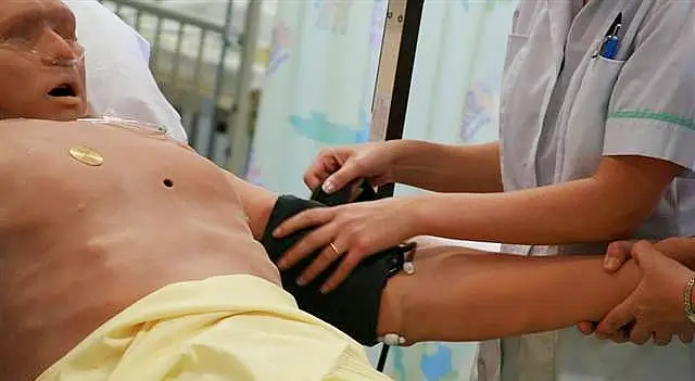 Nursing a mannequin. Photo by University of Salford.