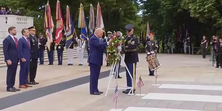 President Donald J. Trump lays a wreath at the Tomb of the Unknown Soldier in Arlington National Cemetery, Va., May 26, 2025. With him VP JD Vance and Defense Secretary Pete Hegseth. Photo by DOD.